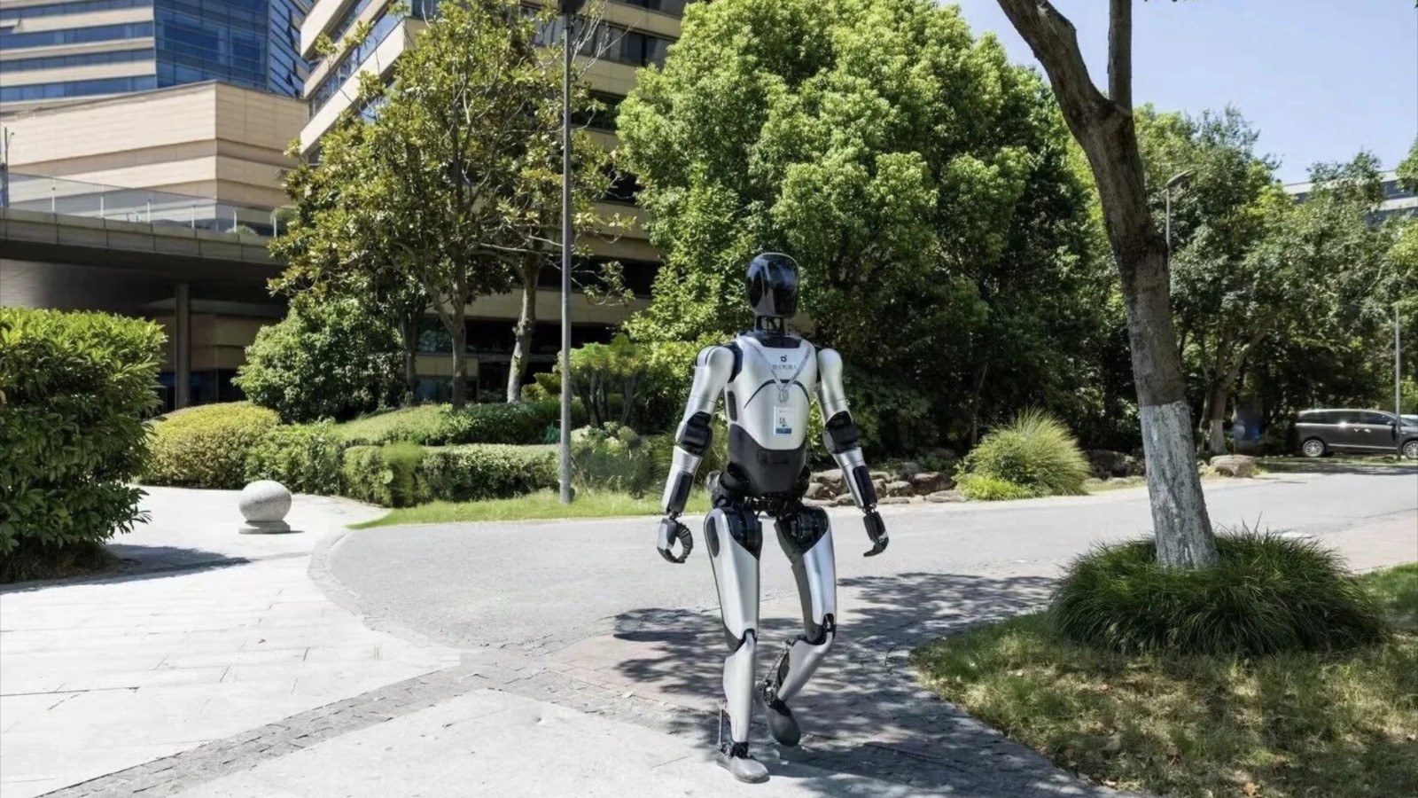 AgiBot A2 Ultra walking outdoors in a manufacturer photograph